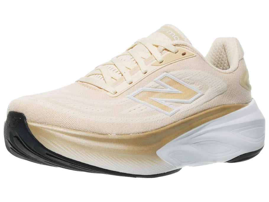 Women's New Balance More v6. Off White upper. White midsole. Lateral view.