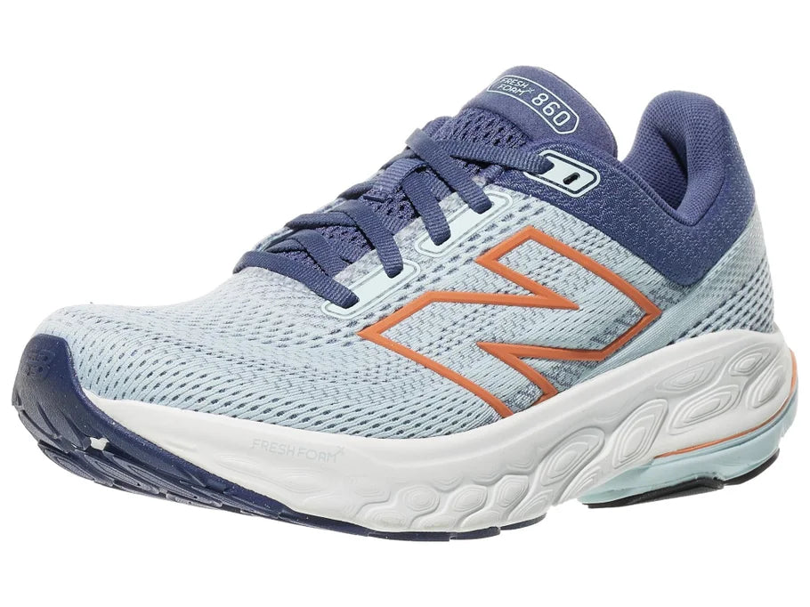 Women's New Balance 860 v14. Light Blue upper. White midsole. Lateral view.