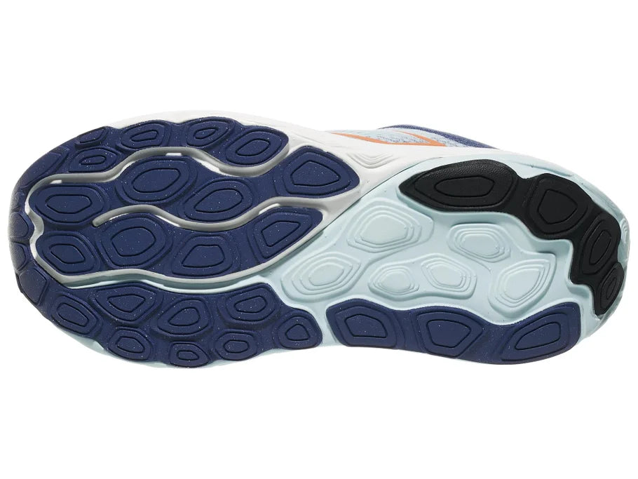 Women's New Balance 860 v14. Light Blue upper. White midsole. Bottom view.