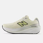 Women's New Balance Fresh Foam X 860 v15. Beige upper. White midsole. Medial view.