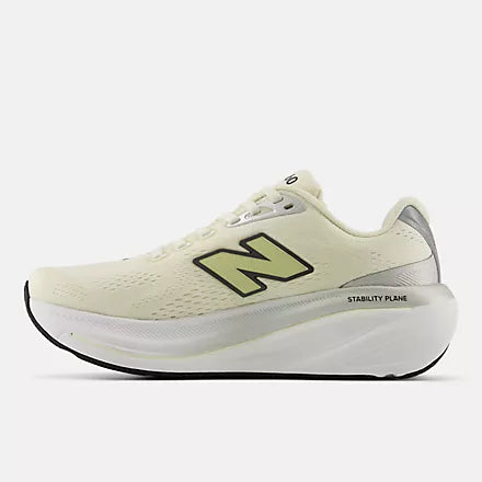 Women's New Balance Fresh Foam X 860 v15. Beige upper. White midsole. Medial view.