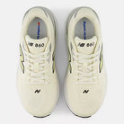 Women's New Balance Fresh Foam X 860 v15. Beige upper. White midsole. Top view.