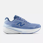 Women's New Balance 860 v15. Blue upper. White midsole. Lateral view.