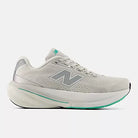 Women's New Balance 860 v15.
Grey upper. White midsole. Lateral view. 