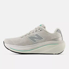 Women's New Balance 860 v15.
Grey upper. White midsole. Medial view. 