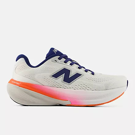 Women's New Balance 860 v15. White upper. White/Pink/Orange midsole. Lateral view.
