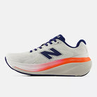 Women's New Balance 860 v15. White upper. White/Pink/Orange midsole. Medial view.