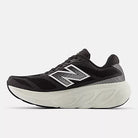 Women's New Balance 80v15. Black upper. White midsole. Medial view.
