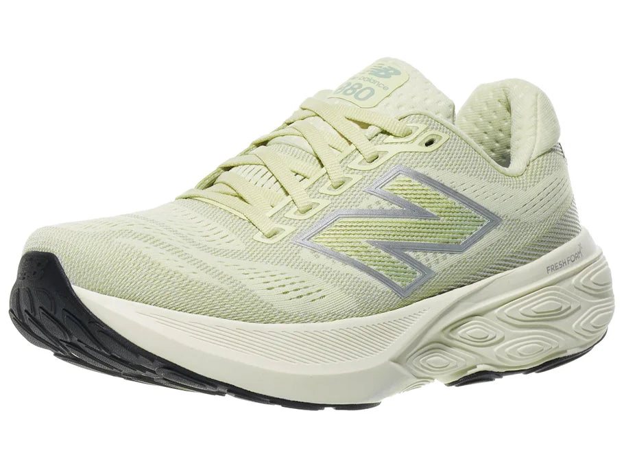 Women's New Balance 880 v15. Light Green upper. Off White midsole. Lateral view.