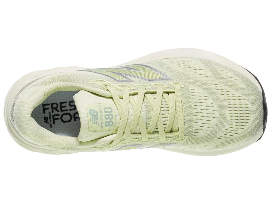 Women's New Balance 880 v15. Light Green upper. Off White midsole. Top view.