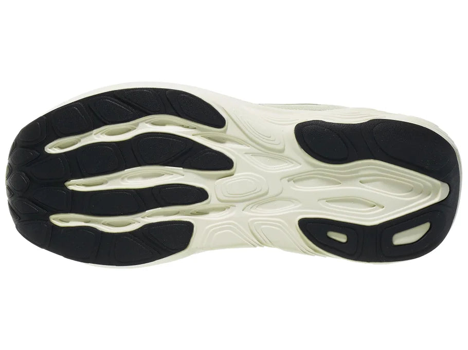 Women's New Balance 880 v15. Light Green upper. Off White midsole. Bottom view.