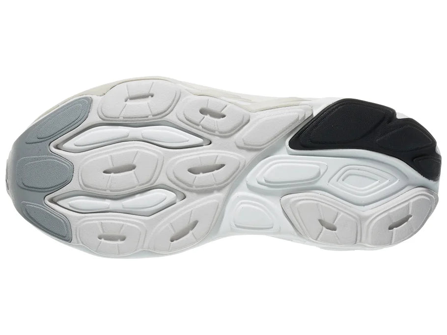 Women's New Balance Balos v1. Light Red upper. White midsole. Bottom view.