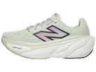 Women's New Balance Fresh Foam X More v5 in Natural Mint/Purple Fuchsia/Black — side profile