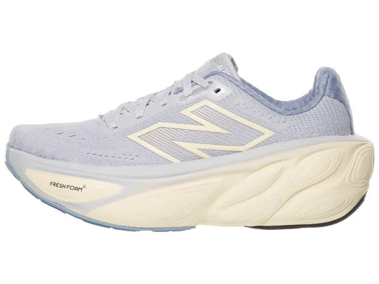 Women's New Balance More v5. Light Purple upper. Off White midsole. Lateral view.