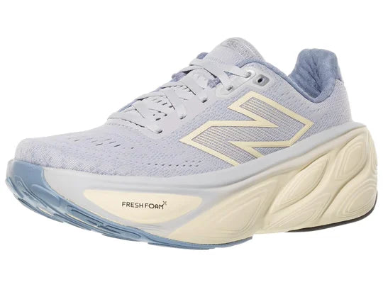 Women's New Balance More v5. Light Purple upper. Off White midsole. Lateral view.