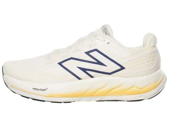 Women's New Balance Vongo v6. White upper. White midsole. Lateral view.