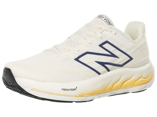 Women's New Balance Vongo v6. White upper. White midsole. Lateral view.
