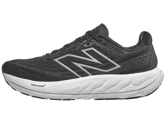 Women's New Balance Vongo v6. Black upper. White midsole. Lateral view.