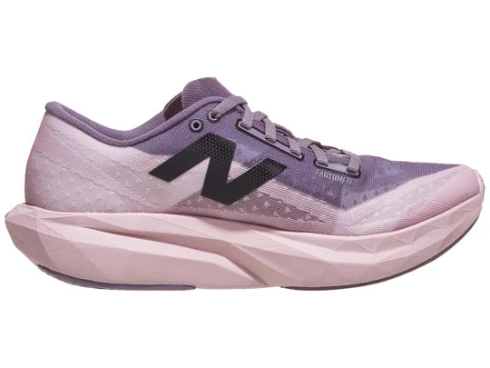 Women's New Balance FuelCell Rebel v4. Purple upper. Purple midsole. Medial view.