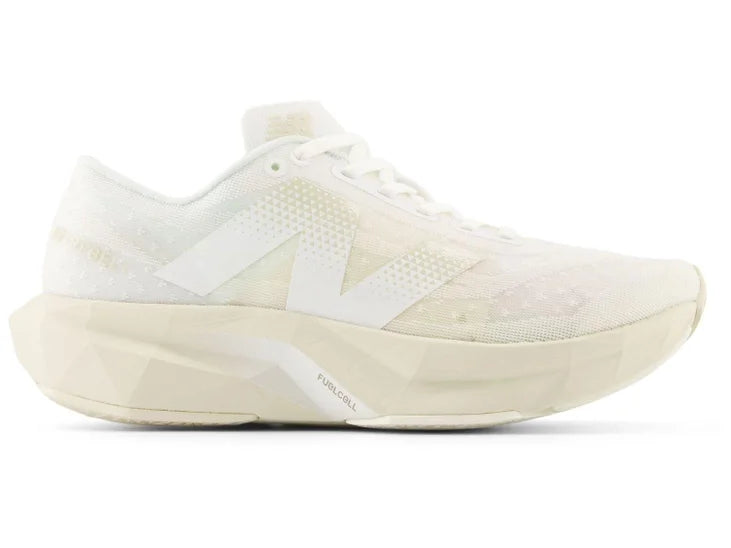 Women's New Balance FuelCell Rebel v4. Off White upper. Off White midsole. Lateral view.