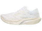 Women's New Balance FuelCell Rebel v4 in White/Linen/Sea Salt — side profile