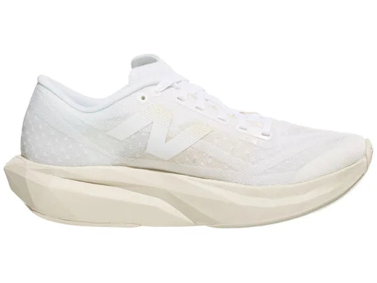 Women's New Balance FuelCell Rebel v4. Off White upper. Off White midsole. Medial view.