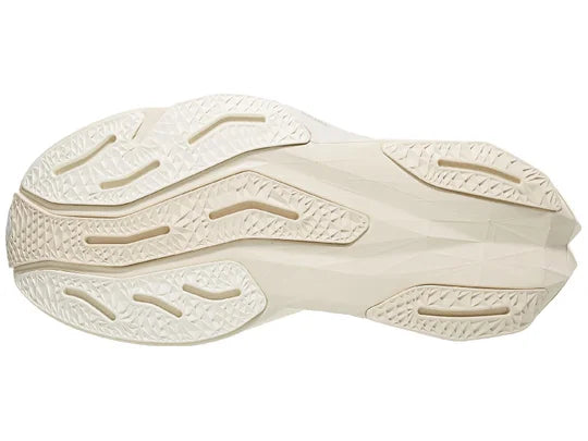 Women's New Balance FuelCell Rebel v4 in White/Linen/Sea Salt — outsole view