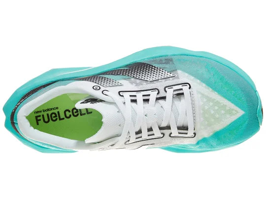 Women's New Balance Rebel v4. Green upper. Green midsole. Top view.