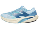 Women's New Balance Rebel v4. Blue upper. Off white midsole. Lateral view.