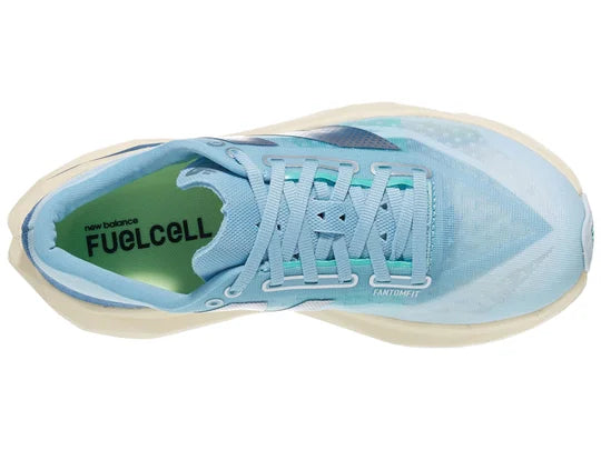 Women's New Balance Rebel v4. Blue upper. Off white midsole. Top view.