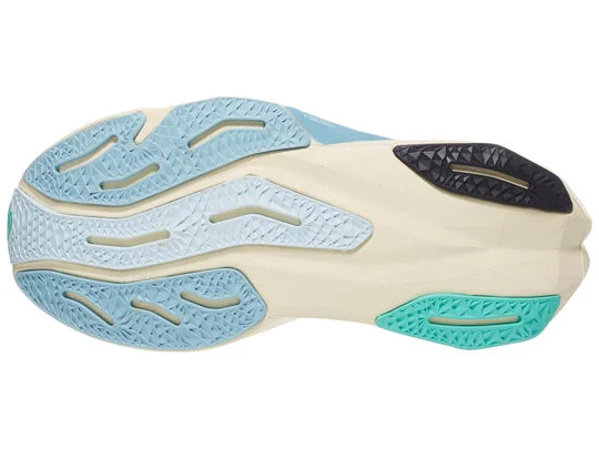 Women's New Balance Rebel v4. Blue upper. Off white midsole. Bottom view.