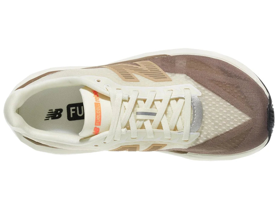 Women's New Balance Rebel v5. Off White/Tan upper. Off White/Tan midsole. Top view.