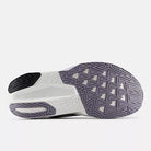 Women's New Balance FuelCell Rebel v5. Grey upper. White midsole. Bottom view.