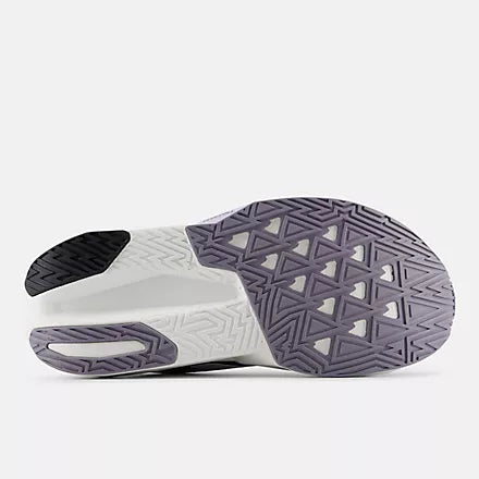 Women's New Balance FuelCell Rebel v5. Grey upper. White midsole. Bottom view.