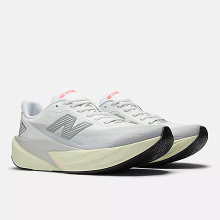 Women's New Balance FuelCell Rebel v5. Grey upper. Off White midsole. Lateral view.