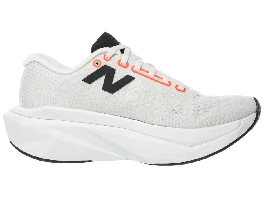 Women's New Balance SuperComp Trainer v3. White upper. White midsole. Medial view.