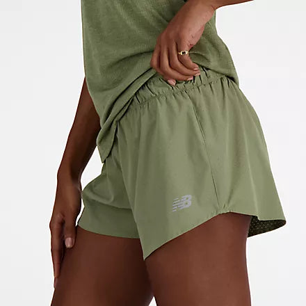 Women's New Balance RC Short. Dark Green. Lateral view.