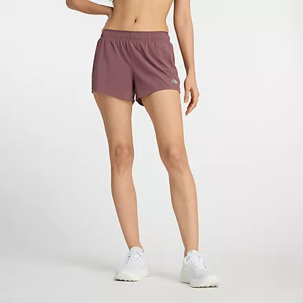 Women's New Balance RC Shorts. Dark Pink. Front view.