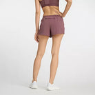 Women's New Balance RC Short 3 inch in Licorice, rear view