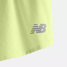 Women's New Balance RC Short 3 inch in Limelight, logo detail