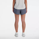 Women's New Balance RC Shorts. Dark Grey. Rear view.