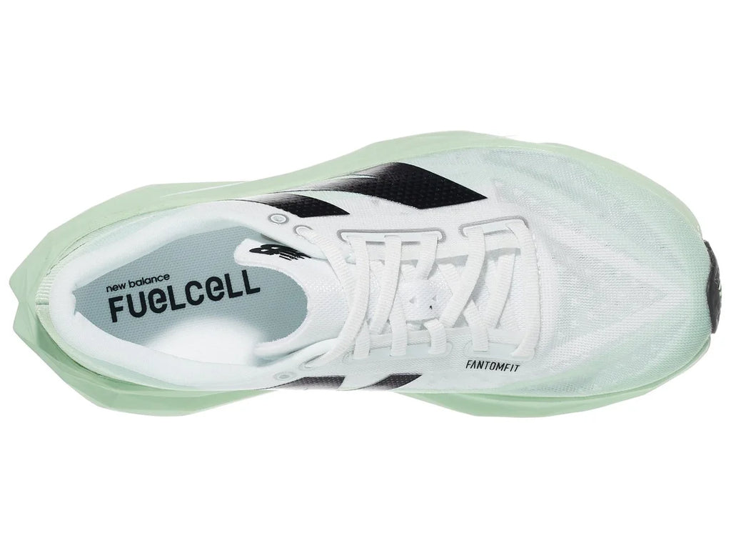 Women's New Balance Rebel v4. Light Green upper. Light Green midsole. Top view.