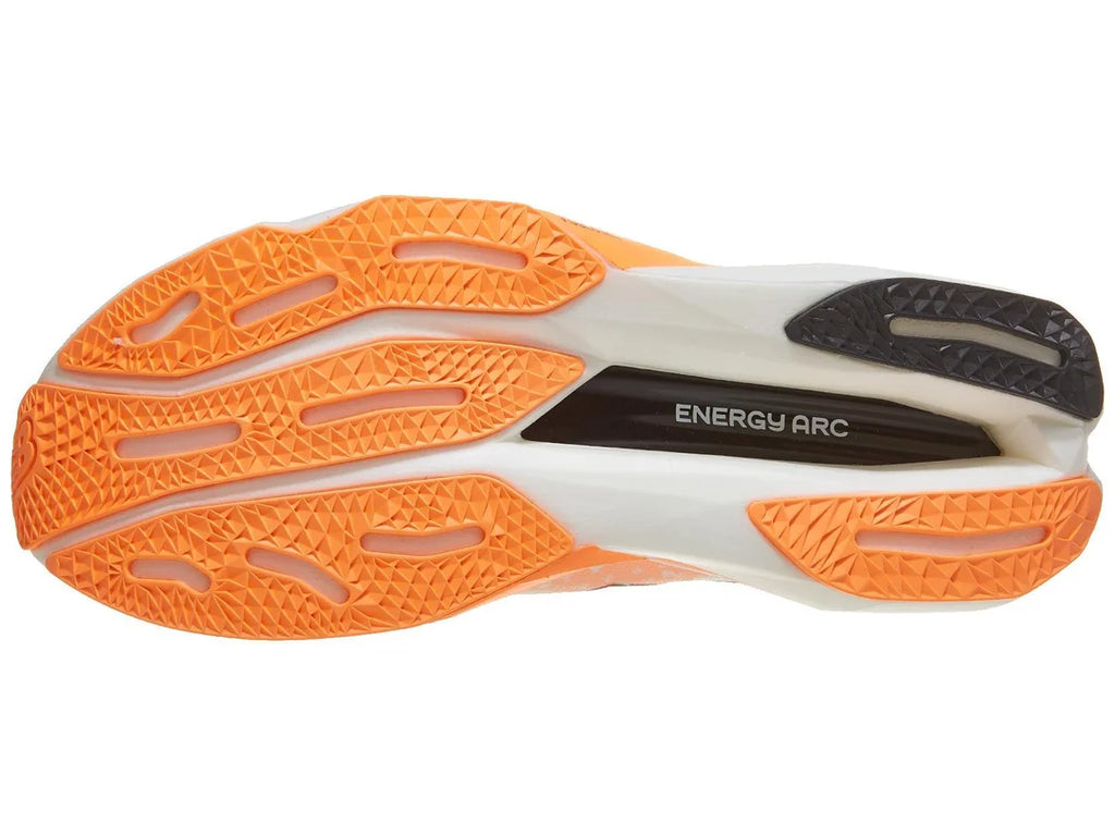 Women's New Balance SuperComp Elite v4. White upper. White and orange midsole. Bottom view.