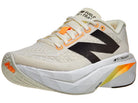 Women's New Balance FuelCell SuperComp Trainer v3. Angora/Hot Mango/Black. Lateral view.