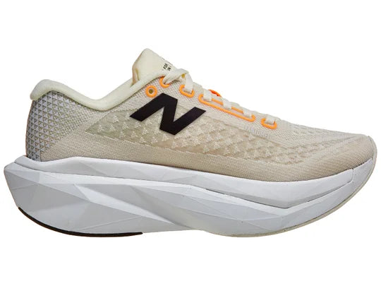 Women's New Balance SuperComp Trainer v3. Off White upper. White midsole. Medial view.
