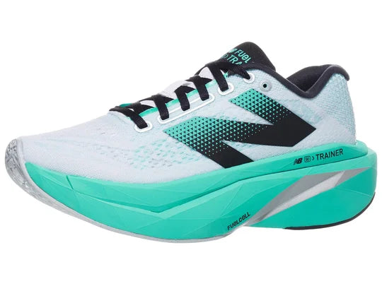 Women's New Balance SuperComp Trainer V3. White upper. Green midsole. Lateral view.