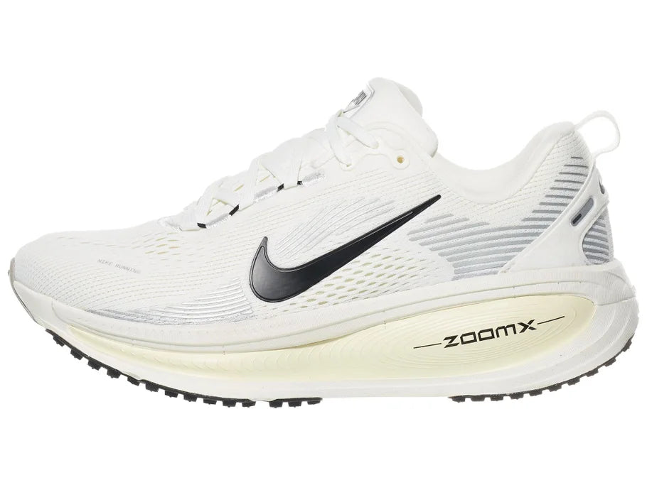 Women's Nike Vomero 18. White upper. Off White midsole. Lateral view.