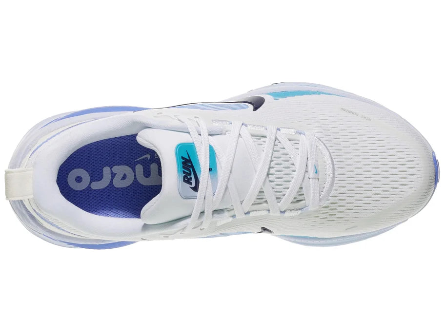 Women's Nike Vomero 18. White upper. Blue midsole. Top view.