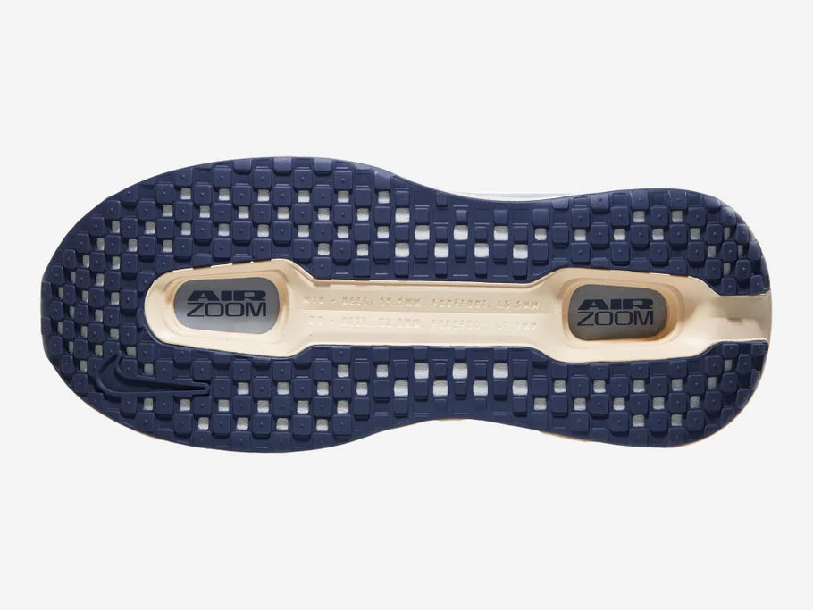Women's Nike Vomero Premium. Blue upper. Off White midsole. Bottom view.