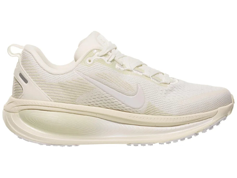 Women's Nike Vomero 18. White upper. White midsole. Medial view.